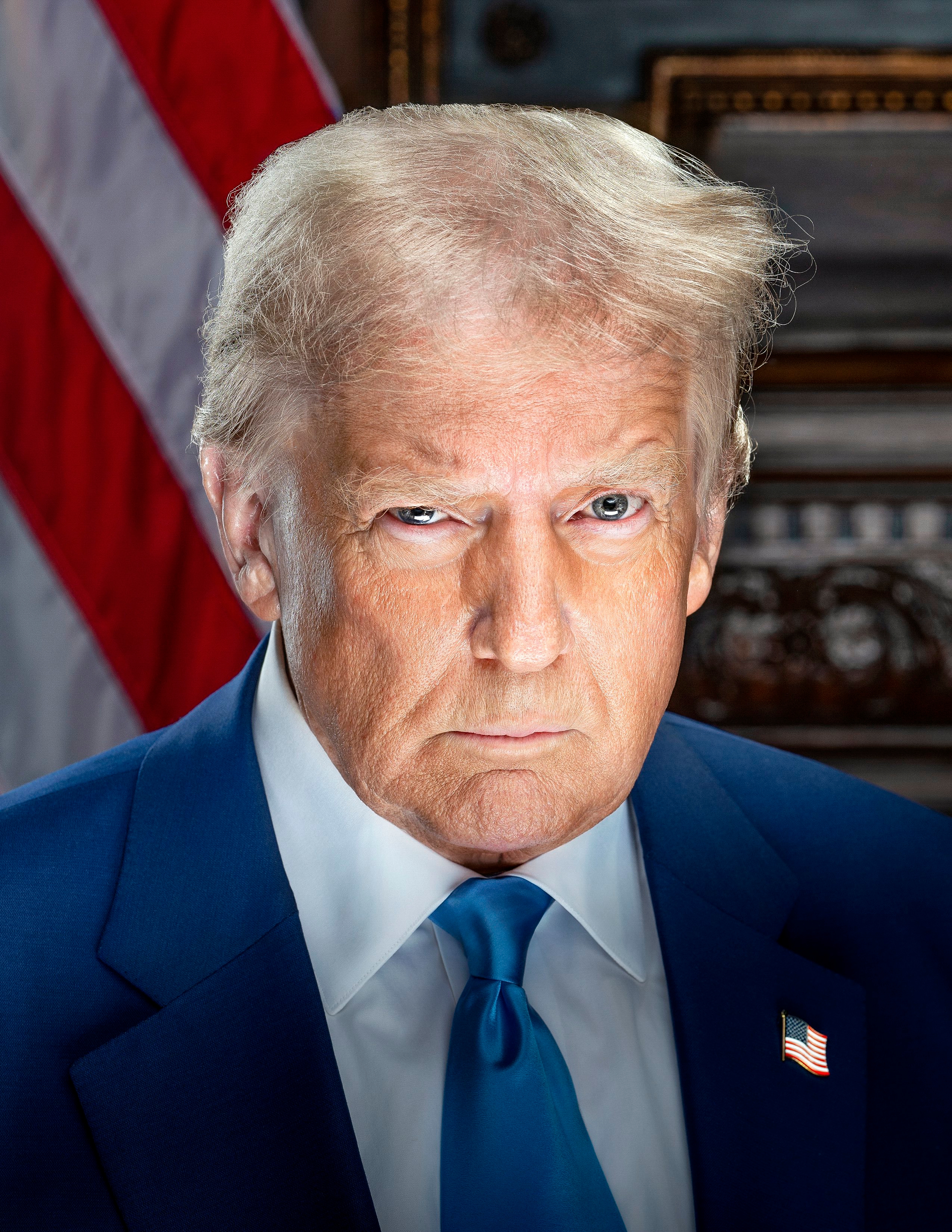 Donald Trump in a blue suit and tie in his January 2025 official portrait.